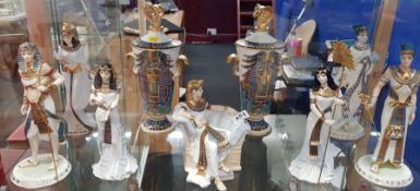 7 WEDGEWOOD EGYPTIAN FIGURES AND 2 VASES WITH LIDS