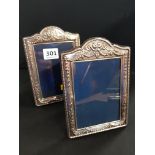 PAIR OF SILVER PHOTO FRAMES