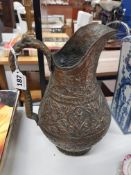 ANTIQUE BRASS AND COPPER DECORATED JUG