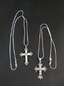 2 SILVER CROSSES ON SILVER CHAINS