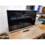 SONY FLAT SCREEN TV WITH REMOTE