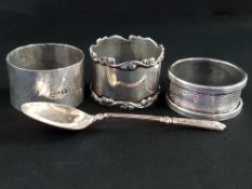 3 SILVER NAPKIN RINGS AND SILVER SPOON