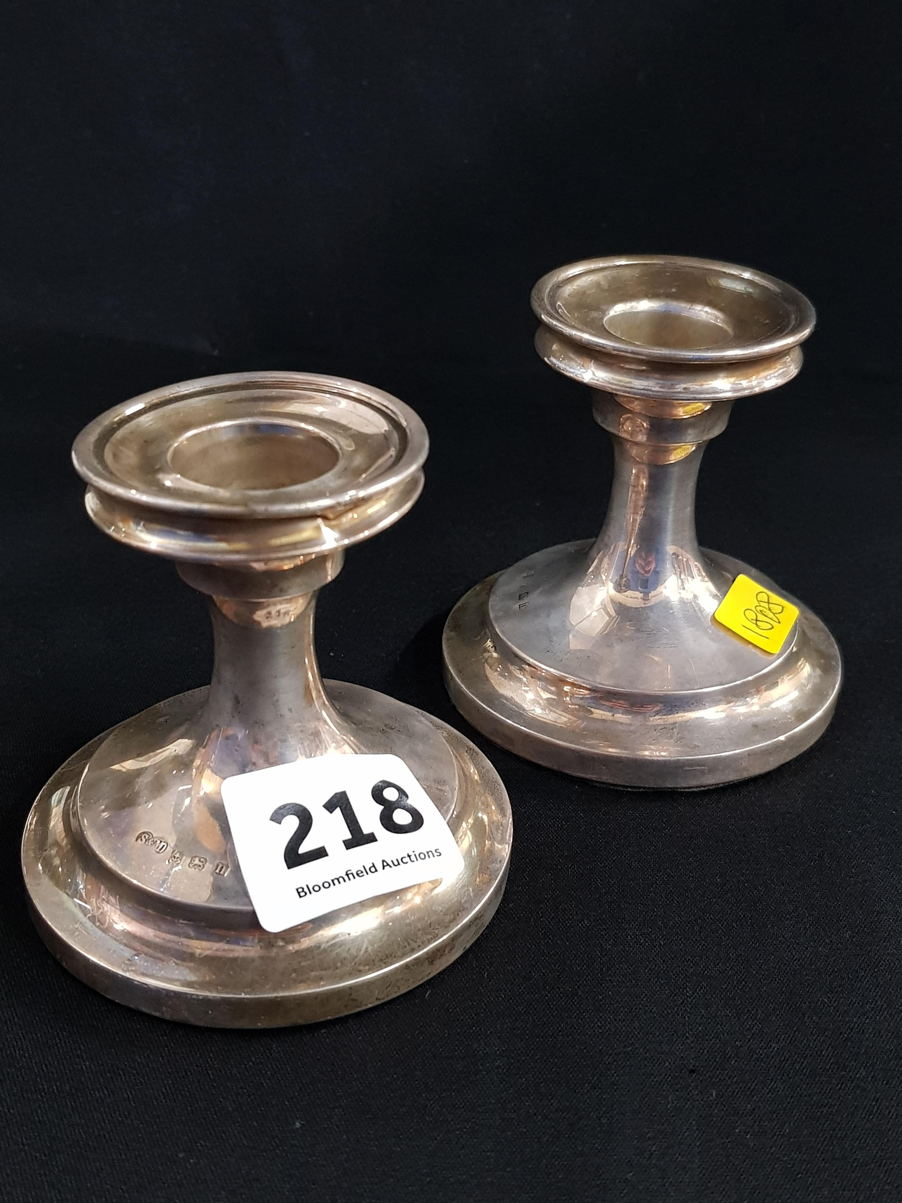 PAIR OF SILVER CANDLESTICKS