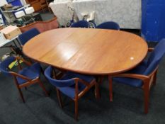G PLAN EXTENDING DINING TABLE AND 6 KAI KRISTIANSEN CHAIRS