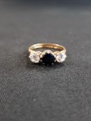 9 CARAT SAPPHIRE AND CZ RING