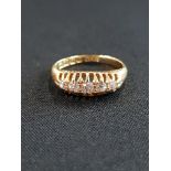 18 CARAT GOLD AND DIAMOND 5 STONE RING