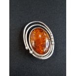 SILVER AND AMBER BROOCH