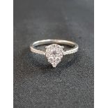 18 CARAT WHITE GOLD DIAMOND RING WITH CIRCA 0.6 CARAT OF DIAMONDS COLOUR D/E CLARITY SI/1 SIZE M1/2