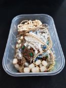 BOX OF VINTAGE NECKLACES AND BEADS