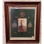 Framed military photo and badges