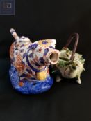 CHINESE 'SHELL' TEAPOT AND JAPANESE COW CREAMER