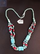 PAIR OF LONG TURQUOISE AND CORAL BEADS