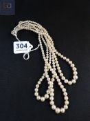 TRIPLE STRAND PEARL NECKLACE WITH SILVER CLASP