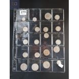 SHEET OF SILVER COINS