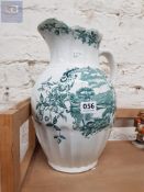 LARGE ANTIQUE GREEN AND WHITE WATER JUG