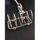 SILVER TOAST RACK SHEFFIELD BY WALKER AND HALL CIRCA 63 GRAMS