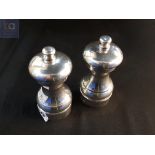 PAIR OF SILVER SALT AND PEPPERS