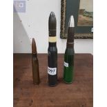 3 LARGE SPENT BULLET SHELLS