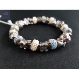 SILVER 'TRUTH' BRACELET WITH SILVER AND CRYSTAL CHARMS