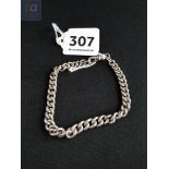 SILVER CURB LINK BRACELET (EACH LINK STAMPED)