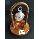 ANTIQUE SILVER POCKET WATCH ON STAND