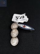 SILVER AND ENAMEL BROOCH AND SILVER COIN BROOCH