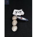 SILVER AND ENAMEL BROOCH AND SILVER COIN BROOCH