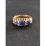 18 CARAT GOLD DIAMOND AND SAPPHIRE RING SIZE J AND 2.8G