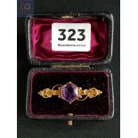 VICTORIAN 9 CARAT GOLD AND AMETHYST BROOCH