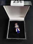 SILVER AND ENAMEL BROOCH TO COMMEMORATE ROYAL VISIT TO NORTHERN IRELAND EMBOSSED ON REAR 23RD JULY