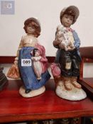 PAIR OF EARLY NAO FIGURES (BOY AND GIRL)