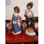 PAIR OF EARLY NAO FIGURES (BOY AND GIRL)