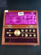CASED SET OF ANTIQUE SCALES AND WEIGHTS