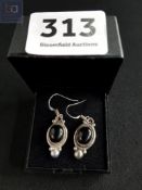 PAIR OF SILVER AND ONYX DROP EARRINGS