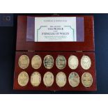 SET OF 12 SOLID SILVER 22 CARAT GOLD PLATED COIN SET