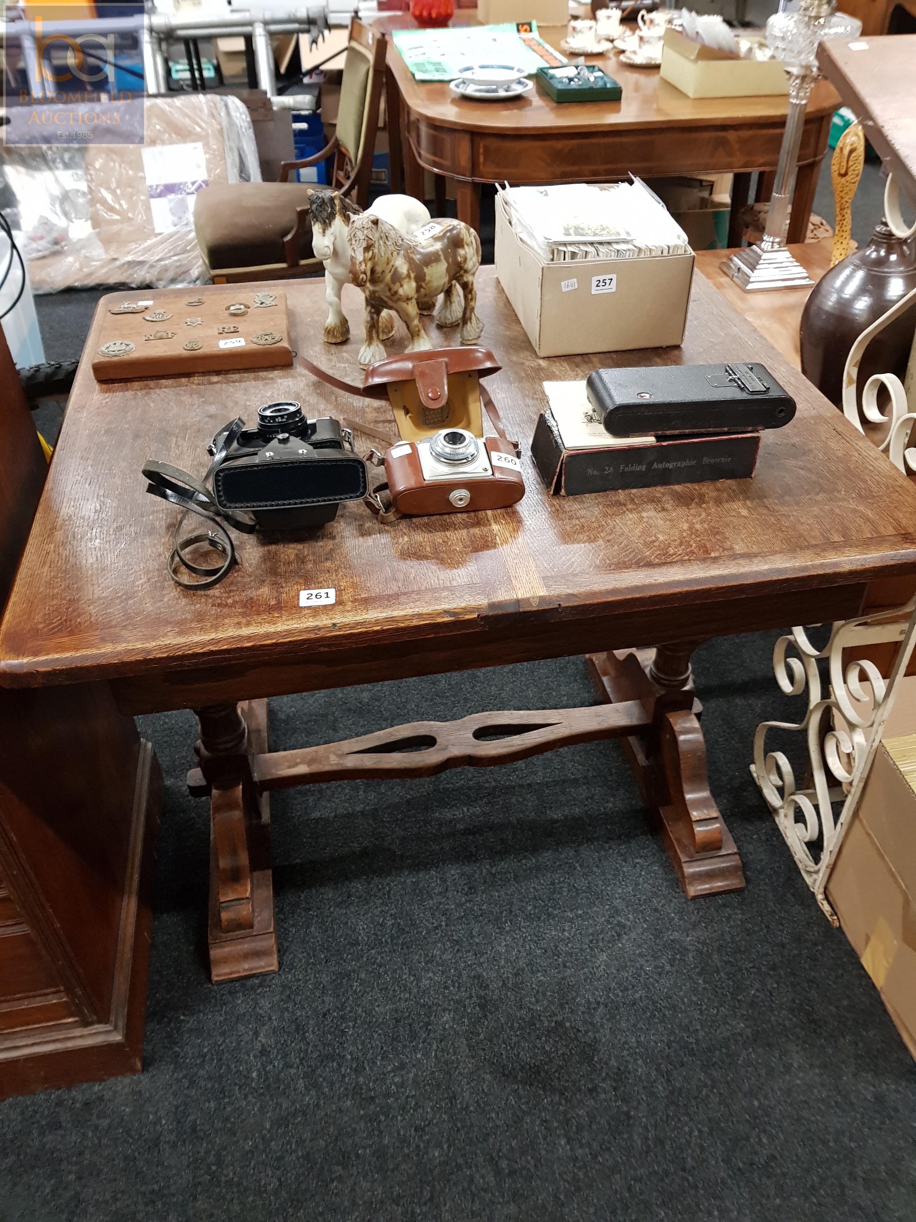 OAK CENTER DROP LEAF EXTENDING DINING TABLE ON A BULBUS SOLID OAK FRAME LEG