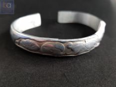 LARGE CONTINENTAL SILVER CHINESE MARK TORQUE BANGLE