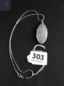 SILVER OVAL LOCKET ON SILVER CHAIN