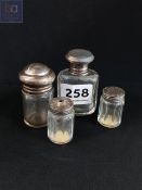 4 SMALL SILVER TOP BOTTLES