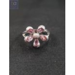 9 CARAT WHITE GOLD PINK SAPPHIRE AND DIAMOND RING