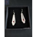 PAIR OF SILVER PLATED RED STONE CRAFTED EARRINGS