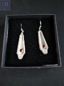 PAIR OF SILVER PLATED RED STONE CRAFTED EARRINGS