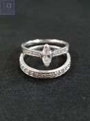 PLATINUM AND DIAMOND SOLITAIRE RING WITH 0.5 CARAT OF DIAMONDS AND PLATINUM AND DIAMOND ETERNITY