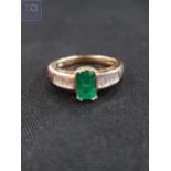 14 CARAT GOLD EMERALD AND DIAMOND RING