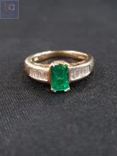 14 CARAT GOLD EMERALD AND DIAMOND RING