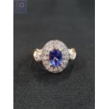 9 CARAT GOLD DIAMOND AND TANZANITE RING