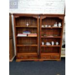 PAIR OF STAINED OPEN BOOKCASES