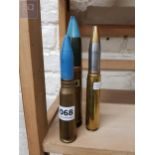 3 LARGE SPENT BULLET SHELLS