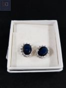 PAIR OF CRYSTAL AND BLUE STONE CLUSTER EARRINGS