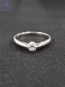 CONTINENTAL WHITE GOLD AND DIAMOND SINGLE STONE RING 1.7 GRAMS